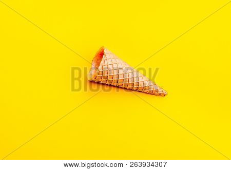 Cone For Ice Creame On Yellow Background. Topv View. Minimalistic Concept