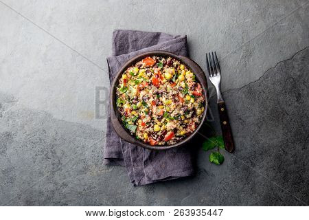 Mexican Black Bean Corn Quinoa Salad In Clay Bowl Top View, Copy Space