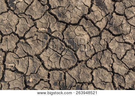 Dry Soil Arid, Drought Land Of India In Summer Seasion.