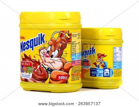 Novyy Urengoy, Russia - October 18, 2018: Yellow Cans Of The Nestle Nesquik Cocoa Isolated Over Whit