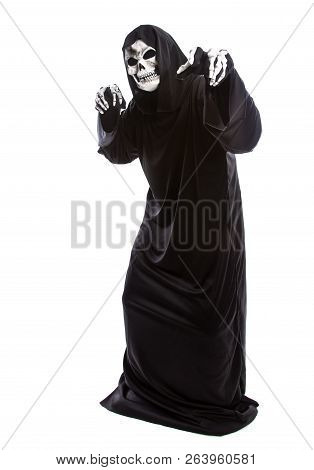 The Grim Reaper Or Death Halloween Costume Isolated On A White Background.  The Skeleton Is Wearing 