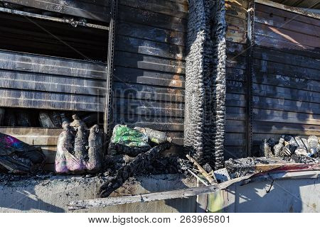 Close Up Damaged Industry Supermarket Metallic Facade After Arson Fire With Burn Debris Of Plastic B