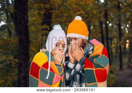 Man And Woman Sneezing, Coughing. Sick Woman And Man Have Cold, Flu And High Fever. They Caught A Co