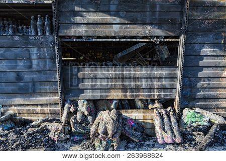 Close Up Damaged Industry Supermarket Metallic Facade After Arson Fire With Burn Debris Of Plastic B