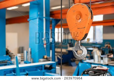 Crane Hook. The System Of Pulleys And Ropes, A Hanging Mechanism In The Production Area. Movement Re