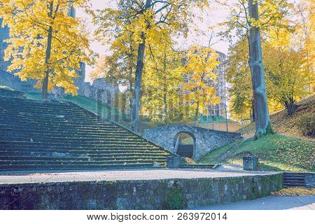 Old Casttle Park At Autumn. Yellow Leafs, Ruins And Architecture. Historic Buildings. Travel Photo 2