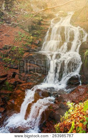 Waterfall Shypot In Gorgeous Evening Light. Beautiful Autumn Scenery Of Carpathian Nature Wonders