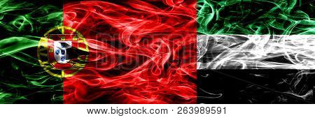 Portugal Vs United Arab Emirates, Emirati Smoke Flags Placed Side By Side. Thick Colored Silky Smoke