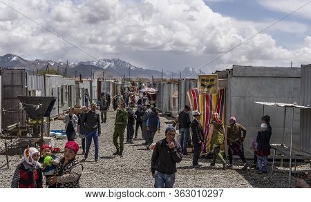 Murghab, Tajikistan - June 25, 2019: The Market With Container Shops And  People In Murghab, Tajikis