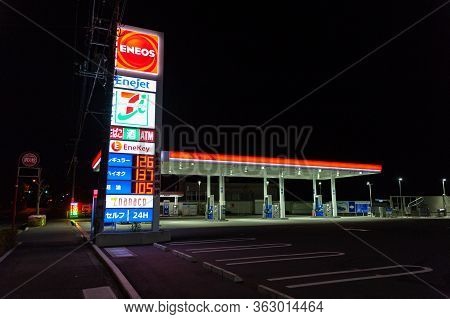 Fuji City, Shizuoka Prefecture, Japan - April 25, 2020: Self-service Eneos Gas Station At Night. Hor