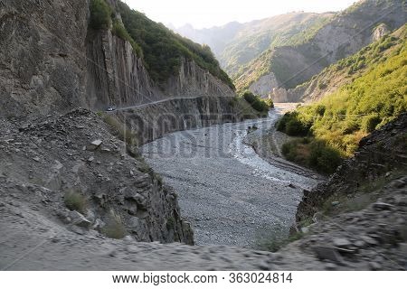 Mountainous Road Leading To Lahic Village In Ismayilli Region Of Azerbaijan, With Car. Mountain Rock