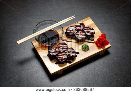 Tasty And Delicious Hot And Cold Sushi Rolls On The Table. Different Sushi - Rolls With Sauce On The