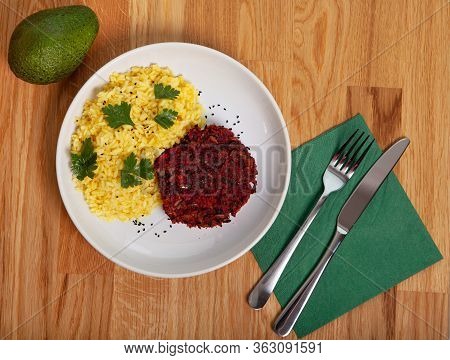 Healthy Vegan Dish - Photo  Flat Lay. Beetroot Chop With Saffron Rice.