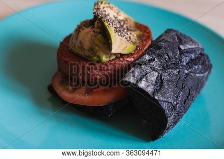 Side View A Beyond Delicious Plant Based Non Meat Burger With Avocado, Chia Seeds, Tomato And Charco