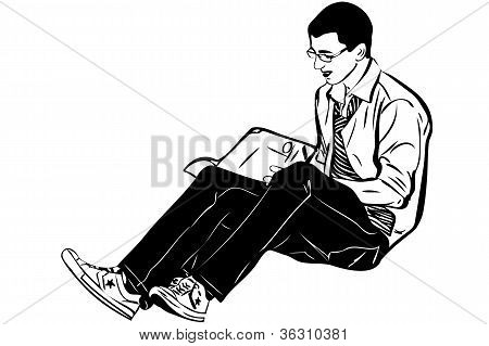 cara com óculos sentado e lendo um livro