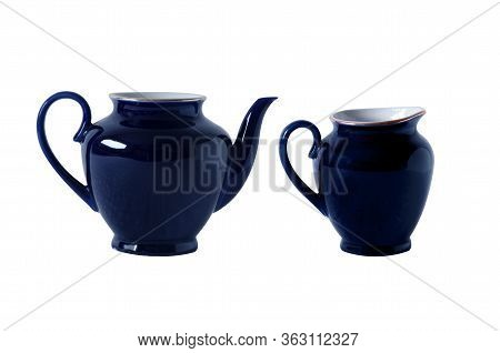 Blue Teapot And Milk Jug With Handle. Isolated Objects On A White Background. Tea Ceremony.