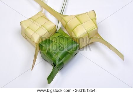 Ketupat, A Type Of Dumpling Made From Rice Packed Inside A Diamond-shaped Container Of Woven Palm Le