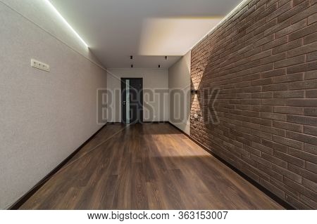 Empty Room Arter Repair Modern Clean Interior With Bricks And Laminate House For Sale