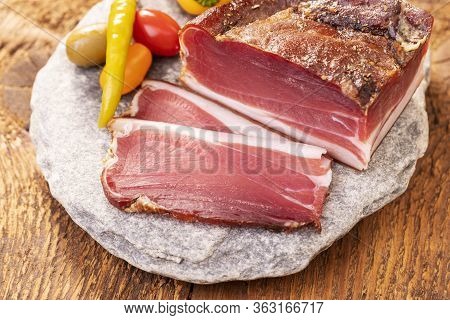 Closeup Of South Tyrolean Speck On Granite