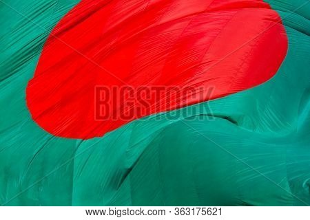 Bangladeshi Flag Waving In Sky At Dhaka, Bangladesh.