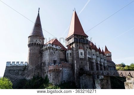 Landscape Of Corvin Castle Or Hunyad Castle With Wooden Bridge In Hunedoara, Romania.