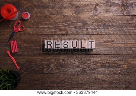 Word Result Wooden Cubes, Blocks On The Subject Of Education, Development And Training On A Wooden B