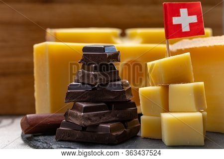 Tasty Swiss Food, Block Of Medium-hard Yellow Cheese Emmental Or Emmentaler With Round Holes, Mature