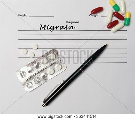 Migrain Diagnosis Written On A White Piece Of Paper. Medical Concept