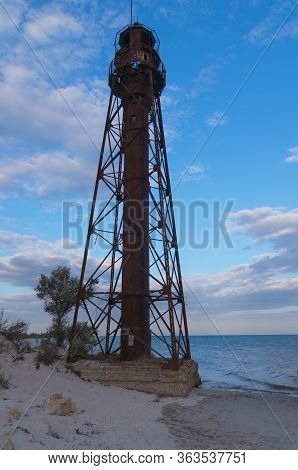 Old Rusty Broken Lighthouse On The Edge Of The Dzharylgach Island In The Black Sea