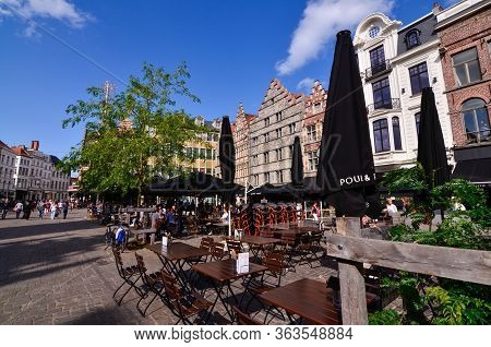 Ghent, Belgium. August 2019. On The Historical Square Of The Center, The Korenmarkt, There Are Bars 