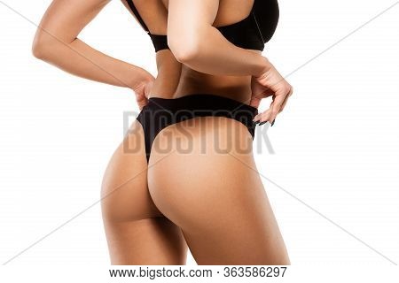 Beautiful Female Back And Buttlocks Isolated On White Background. Beauty, Cosmetics, Spa, Depilation