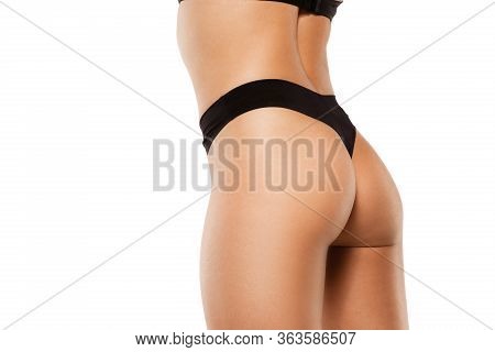 Beautiful Female Back And Buttlocks Isolated On White Background. Beauty, Cosmetics, Spa, Depilation