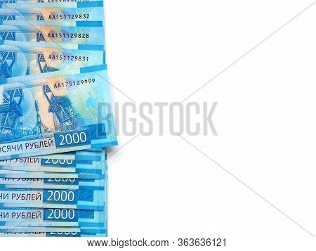 Russian Banknotes Of 2000 Rubles. On The Right There Is A Place For Text. The Background Is White. T