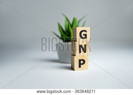 Gnp Gross National Product Sign On Colorful Wooden Cubes, Business Concept.