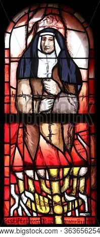 HOHENBERG, GERMANY - MAY 06, 2014: Saint Edith Stein, stained glass window by Sieger Koder in St. James church in Hohenberg, Germany