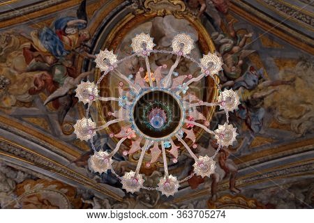 Urbino,  Italy - January 3, 2019: Crystal Chandelier At The Oratorio Di Santo Giuseppe Or Oratory Of
