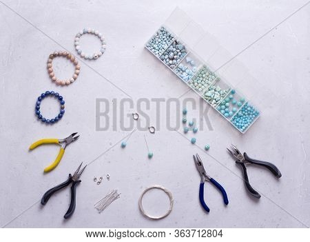 Making Of Handmade Jewellery. Top View. Beads, Tools For Creating Jewelry. Preparation For Handmade.