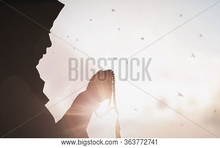 Young Female Muslim Prayer With Hijab Praying To God Front Of White Background Concept For Eid Mubar