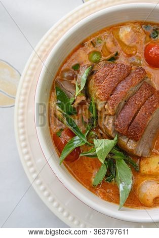 Kaeng Pled Ped Yang (roasted Duck In Red Curry With Tomato,pineapple,lychee Prepared In Coconut Milk