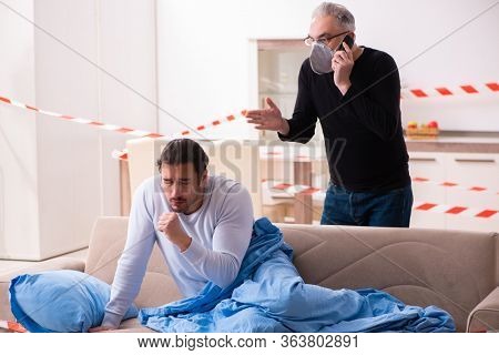 Father and son in coronavirus disease concept at home