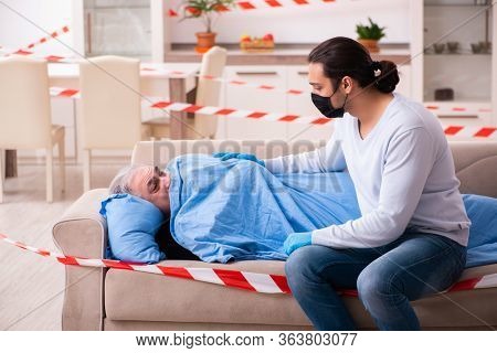 Father and son in coronavirus disease concept at home