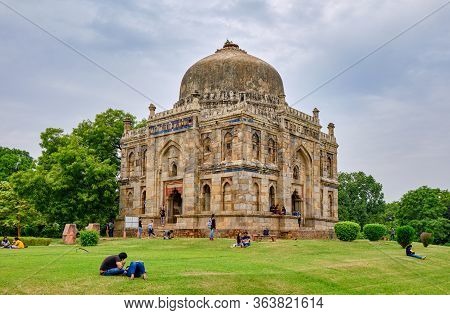 People Having Picnic In Lodi Gardens In New Delhi, India