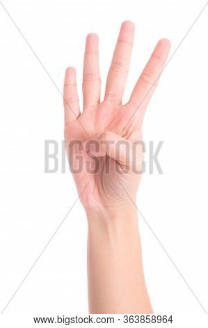 Woman's Hand Is Counting Number 4 Or Four Isolated On White  Background. The Concept Of Hand Symbols