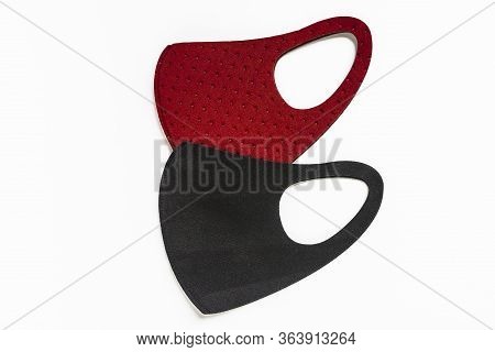Red And Black Neoprene Masks Top View On White Background