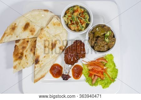 Indian Style And Thai Style Mixed Fusion Food Platter. Fusion Cuisine Is Cuisine That Combines Eleme