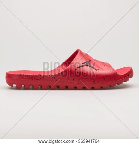 Vienna, Austria - February 19, 2018: Nike Jordan Super Fly Team Slide Red And Black Sandal On White 