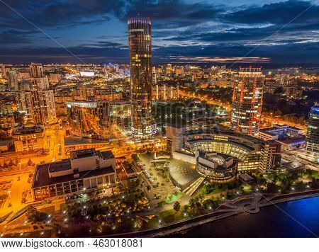 Yekaterinburg City And Pond Aerial Panoramic View At Summer Or Early Autumn Night. Night City In The