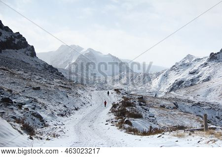 Alpine Snow-covered Tuyuksu Glacier With A Road In A Mountain Gorge In Winter. Snow-covered Highland