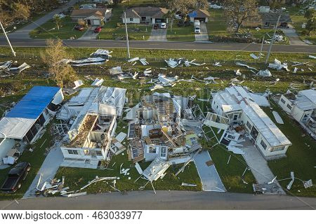 Hurricane Ian Destroyed Homes In Florida Residential Area. Natural Disaster And Its Consequences.