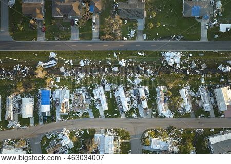 Hurricane Ian Destroyed Homes In Florida Residential Area. Natural Disaster And Its Consequences.